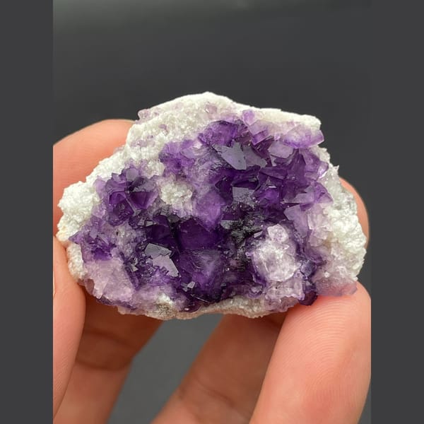 Deep purple fluorite cubes on white matrix from Inner Mongolia — detail view