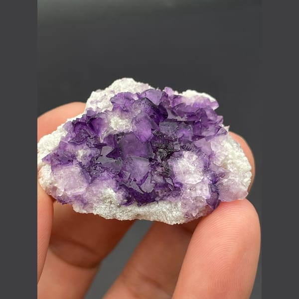 Deep purple fluorite cubes on white matrix from Inner Mongolia — detail view