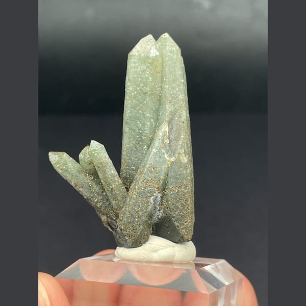 Slender green included quartz crystals from Inner Mongolia — complete view