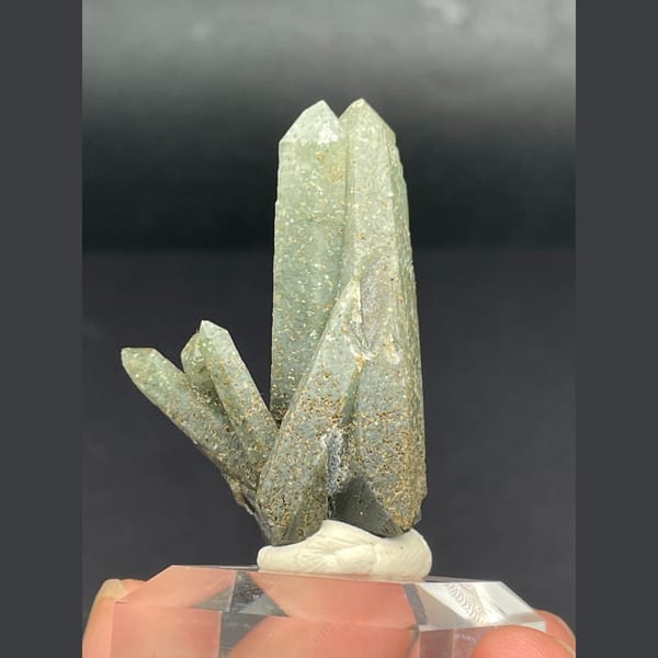 Slender green included quartz crystals from Inner Mongolia — detail view