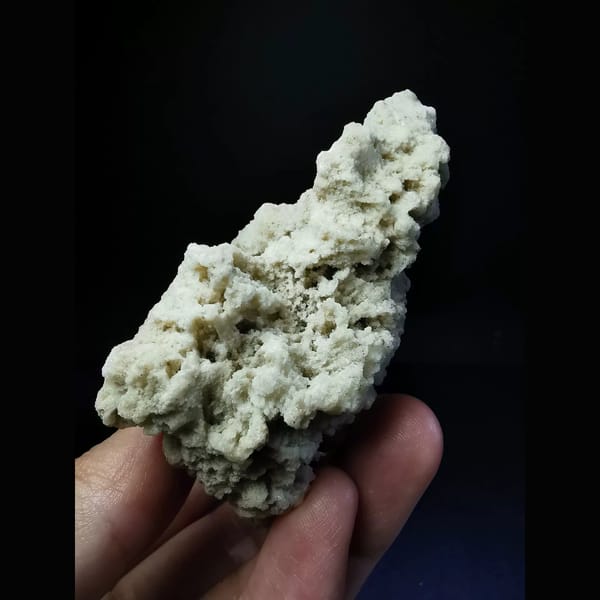 Naturally etched off-white calcite — alternate view