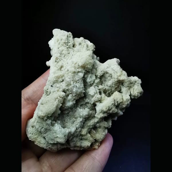 Naturally etched off-white calcite — alternate view
