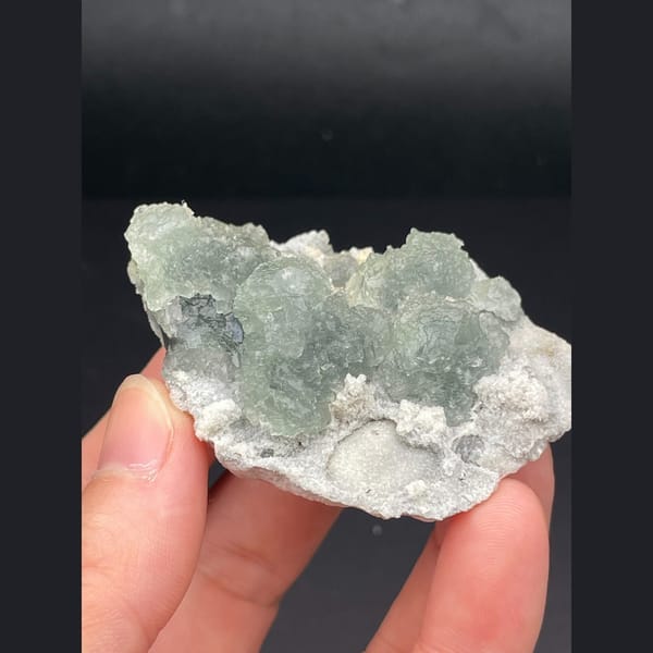 Pale green fluorite on white sugary matrix from Fujian — detail view
