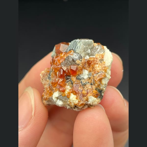 Orange spessartine garnet with smoky quartz and mica from Fujian — complete view