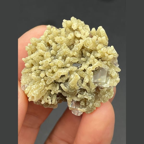 Clear fluorite cubes in pale mica from Inner Mongolia — alternate view