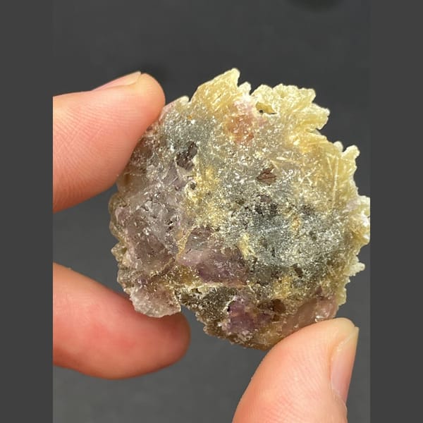 Clear fluorite cubes in pale mica from Inner Mongolia — detail view
