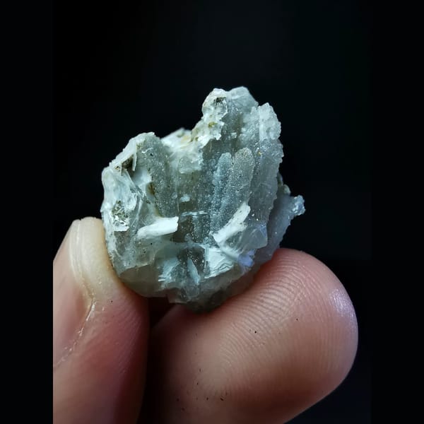 Sparkly small quartz cluster with calcite — alternate view