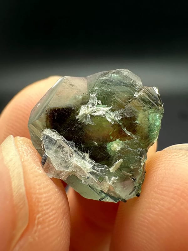 Green fluorite from Namibia, complete reverse view showing irregular cleavage surfaces