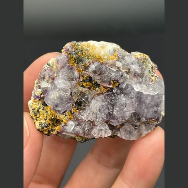 Pale lavender fluorite cubes on golden matrix from Inner Mongolia — complete view