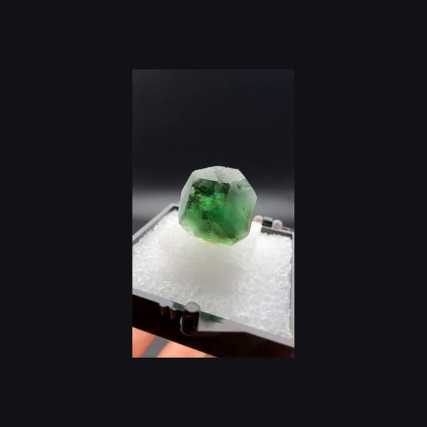 Whole green fluorite crystal from Namibia, front view
