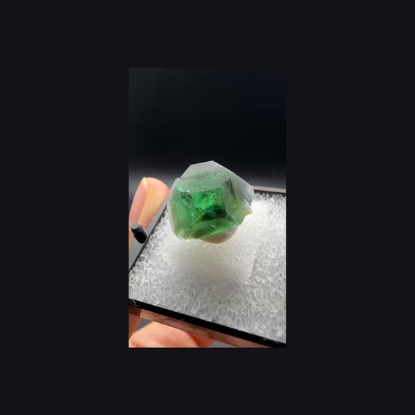 Whole green fluorite crystal from Namibia, side view