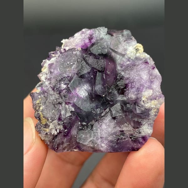Rounded druse of purple fluorite cubes from Inner Mongolia — complete view