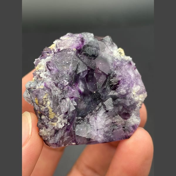 Rounded druse of purple fluorite cubes from Inner Mongolia — alternate view