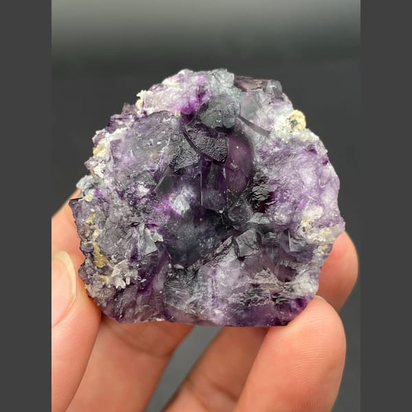 Rounded druse of purple fluorite cubes from Inner Mongolia — alternate view
