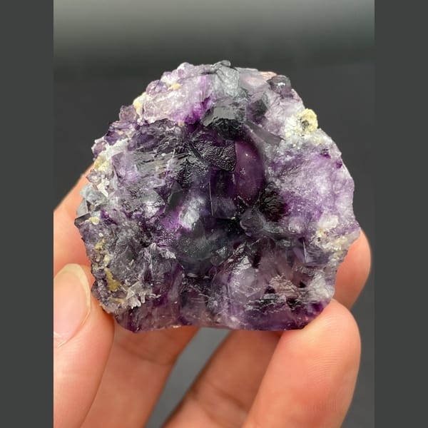 Rounded druse of purple fluorite cubes from Inner Mongolia — detail view