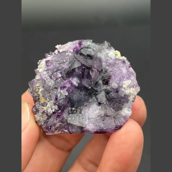 Rounded druse of purple fluorite cubes from Inner Mongolia — detail view