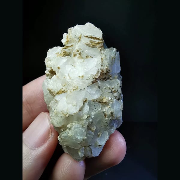 Calcite cluster that fluoresces red — complete view