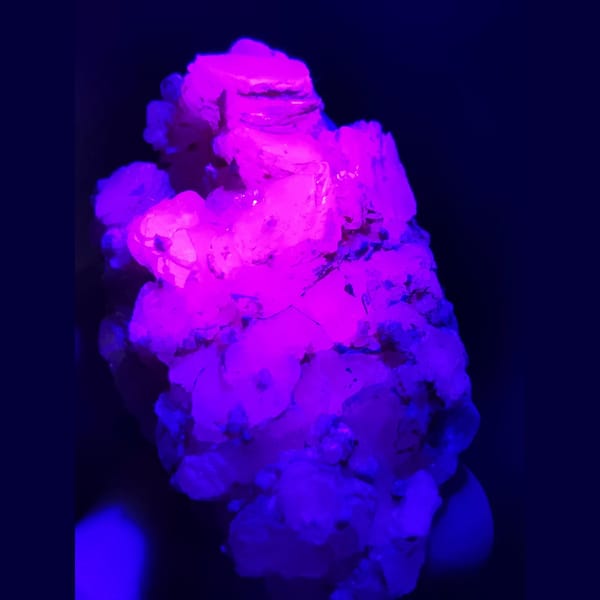 Calcite cluster that fluoresces red — alternate view