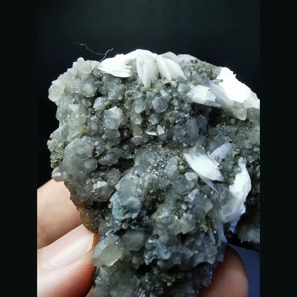 Small quartz cluster with white calcite plates — alternate view