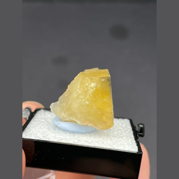 Small golden yellow fluorite cube from Beijing — complete view