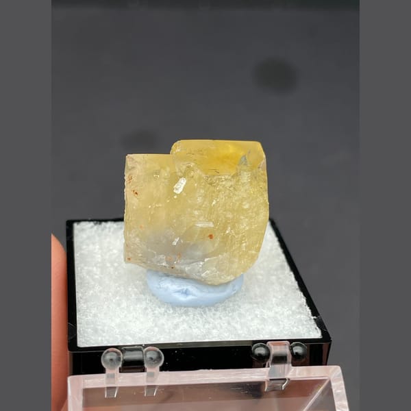 Small golden yellow fluorite cube from Beijing — detail view