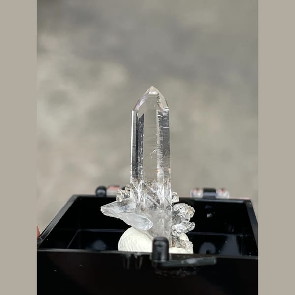 Slender water-clear quartz crystals from Guangdong — complete view
