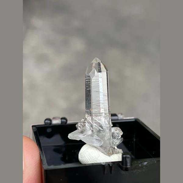 Slender water-clear quartz crystals from Guangdong — alternate view