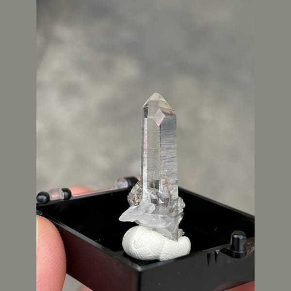 Slender water-clear quartz crystals from Guangdong — alternate view