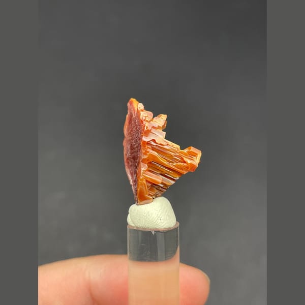 Skeletal red-orange vanadinite crystal group from Morocco — alternate view