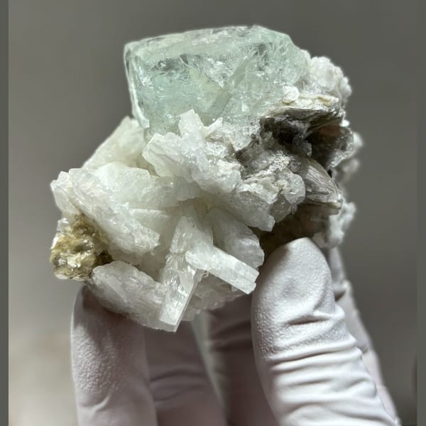 Fluorite with Albite and Mica Xuebaoding 7.6 cm — detail view