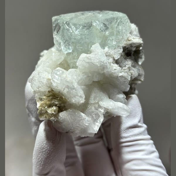 Fluorite with Albite and Mica Xuebaoding 7.6 cm — detail view