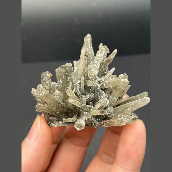 Radiating star-like grey quartz cluster from Inner Mongolia — complete view