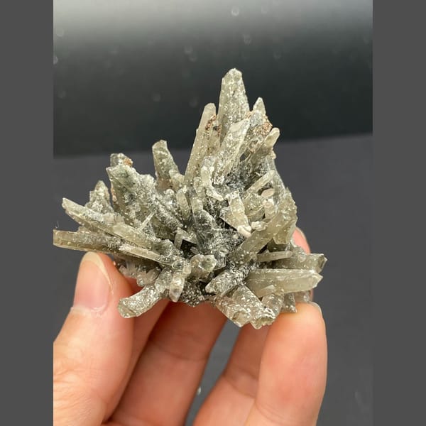 Radiating star-like grey quartz cluster from Inner Mongolia — alternate view