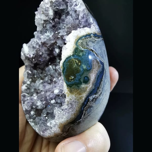 Deep Uruguayan amethyst geode with a blue agate rim — alternate view