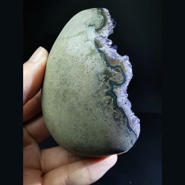 Deep Uruguayan amethyst geode with a blue agate rim — alternate view