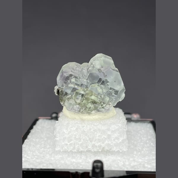 Small bright pale green fluorite from Fujian — complete view