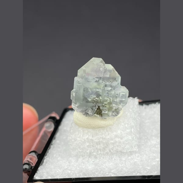Small bright pale green fluorite from Fujian — alternate view