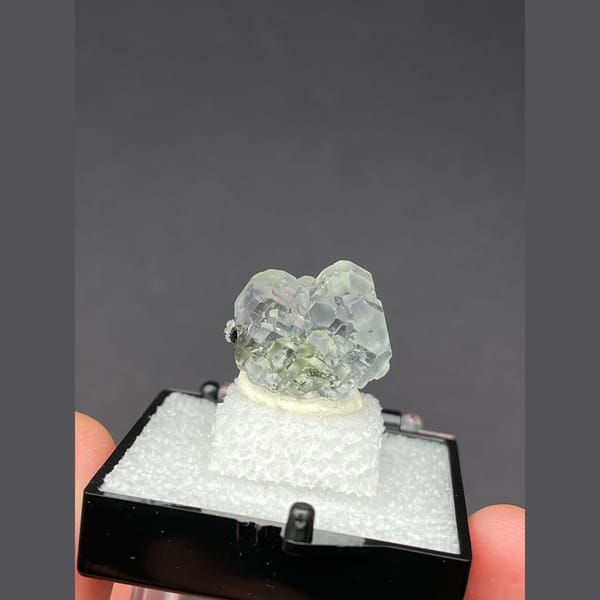 Small bright pale green fluorite from Fujian — detail view