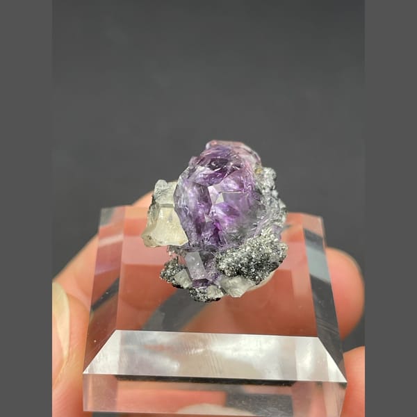 Small tanzanite blue-violet fluorite on matrix from Fujian — detail view