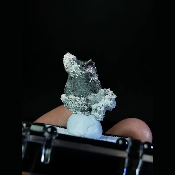 Bright silver platy loellingite with quartz — alternate view