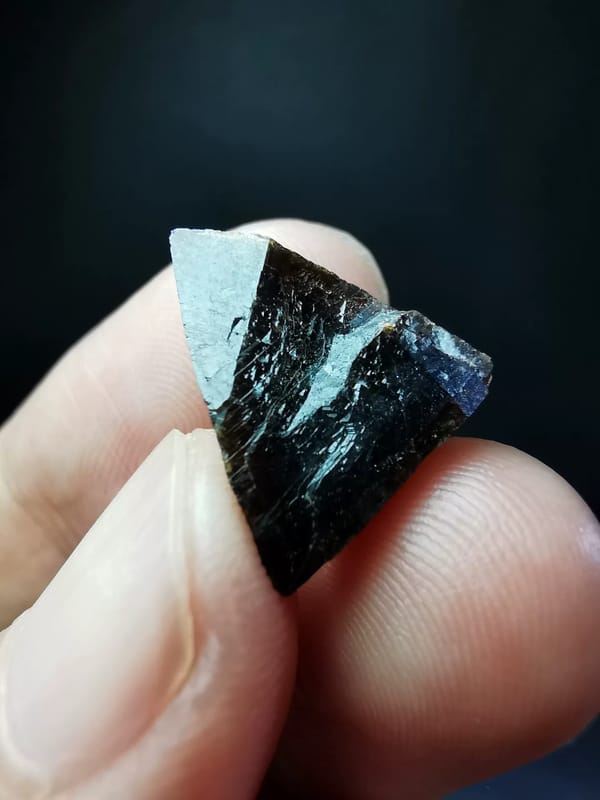 Reflective reverse face of the exact garnet crystal