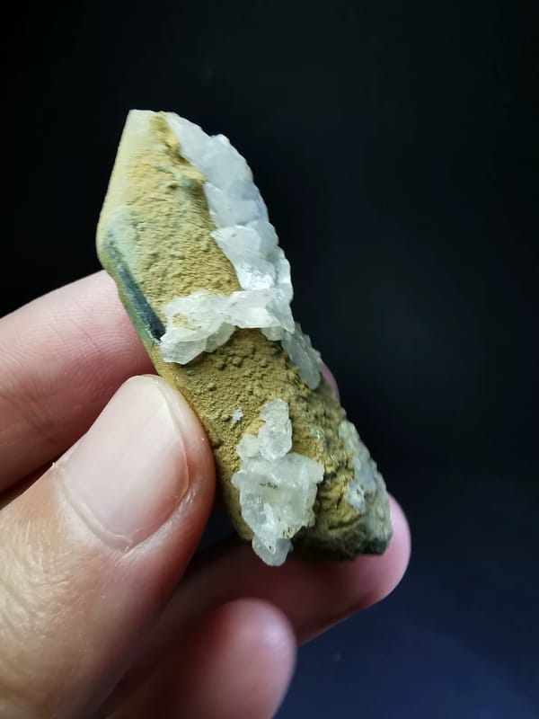 Yellow-coated double-terminated quartz with white calcite — complete side view