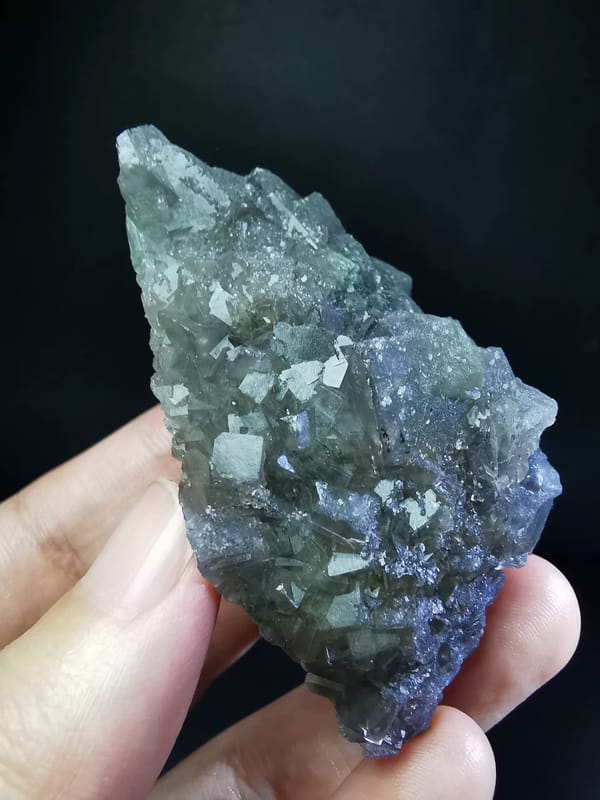 Gray-green fluorite cluster — complete oblique side view