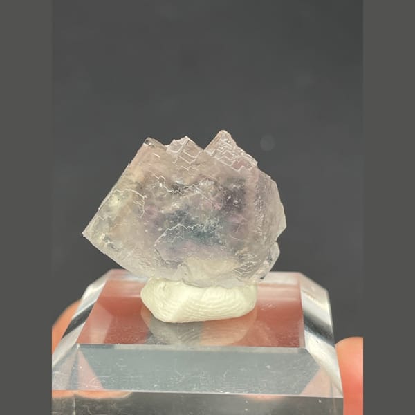 Translucent pale lilac fluorite crystal from Zhejiang — complete view