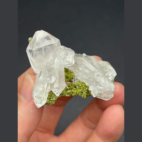 Water-clear quartz cluster with green epidote from Meigu, Sichuan — alternate view