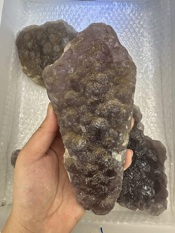 Four-Piece Purple Fluorite Lot, side view