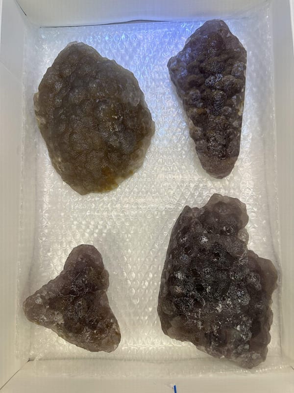 Four-Piece Purple Fluorite Lot, close-up of the surface