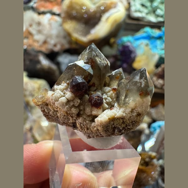Smoky quartz crystal with garnet, natural mineral specimen, photo 1 of 6
