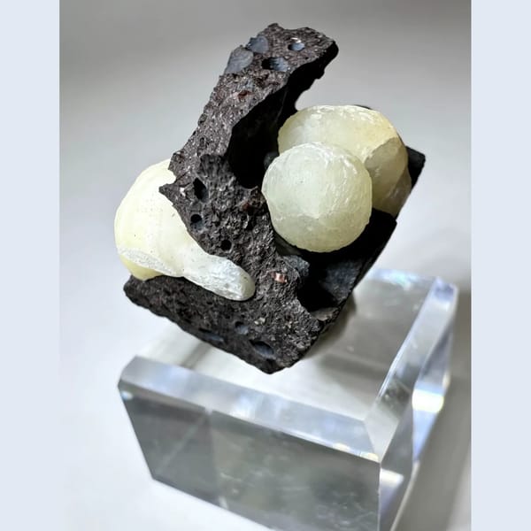 White calcite globular aggregates in basalt from Zhejiang, China, natural mineral specimen, photo 1 of 3