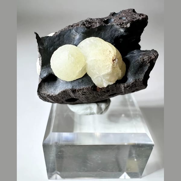 Calcite globular aggregates in basalt from Zhejiang, 3.5 cm across, raw mineral specimen, photo 2 of 3
